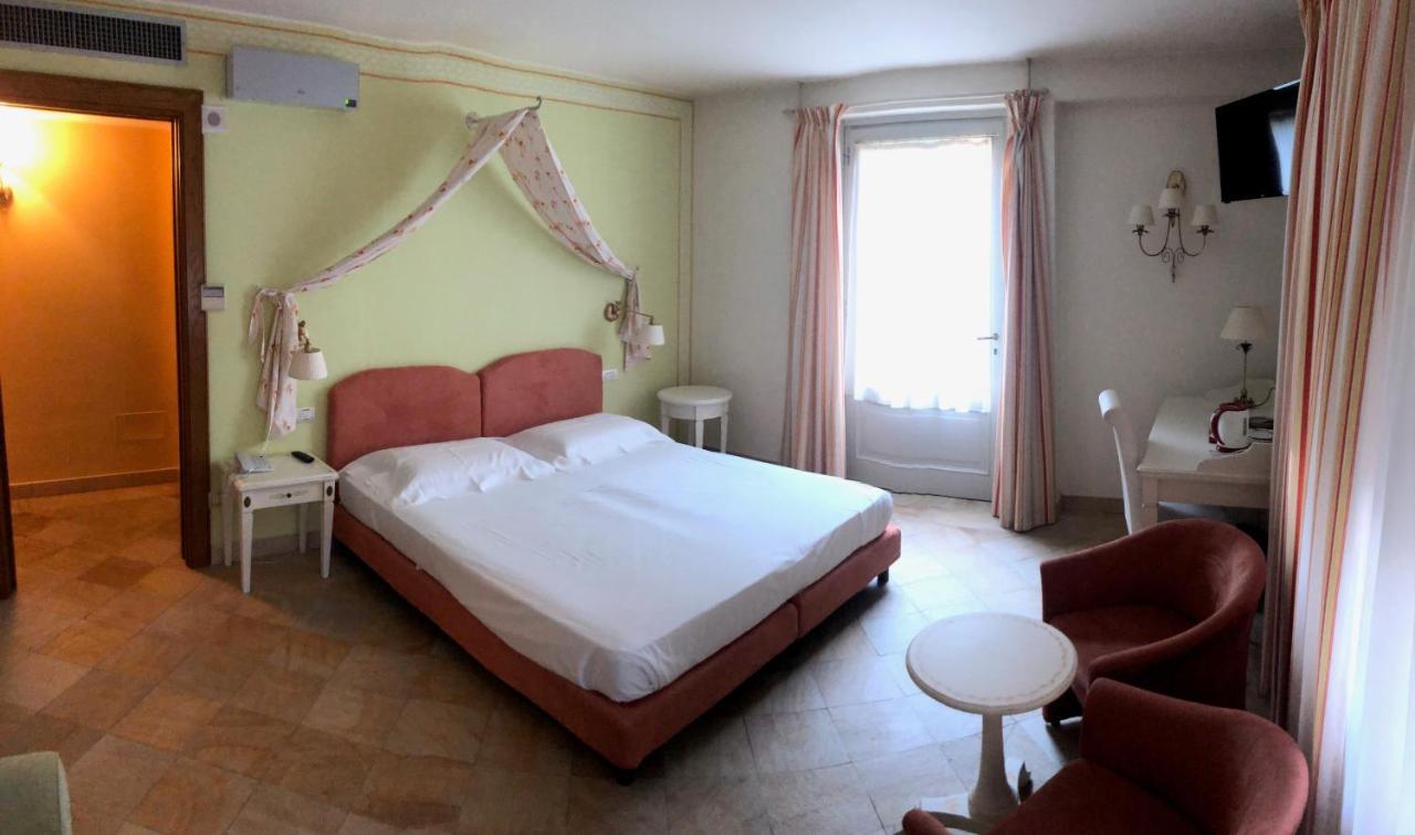 Poggio Radicati Hotel De Charme ซาลุซโซ ภายนอก รูปภาพ